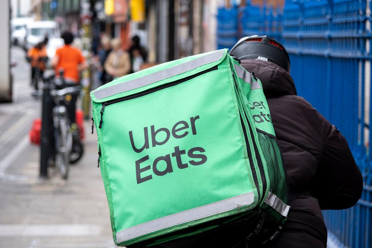 America’s labor market is cooling, and workers are quietly turning to Uber and DoorDash to fill the income gap