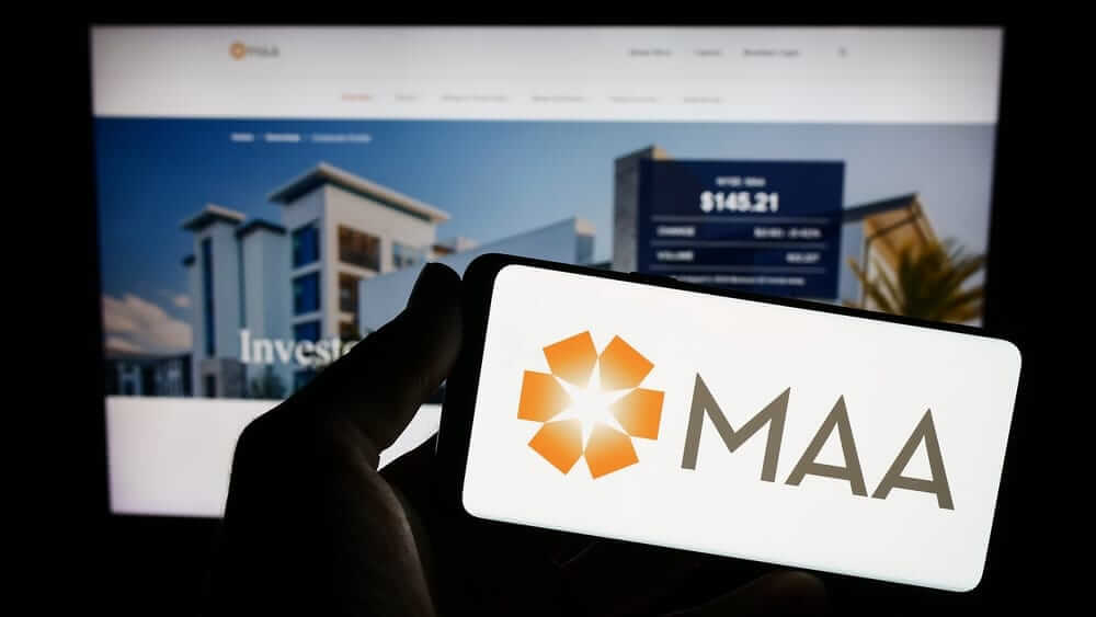 Mid-America Apartment Communities, Inc_ logo on phone and site-by T_Schneider via Shutterstock